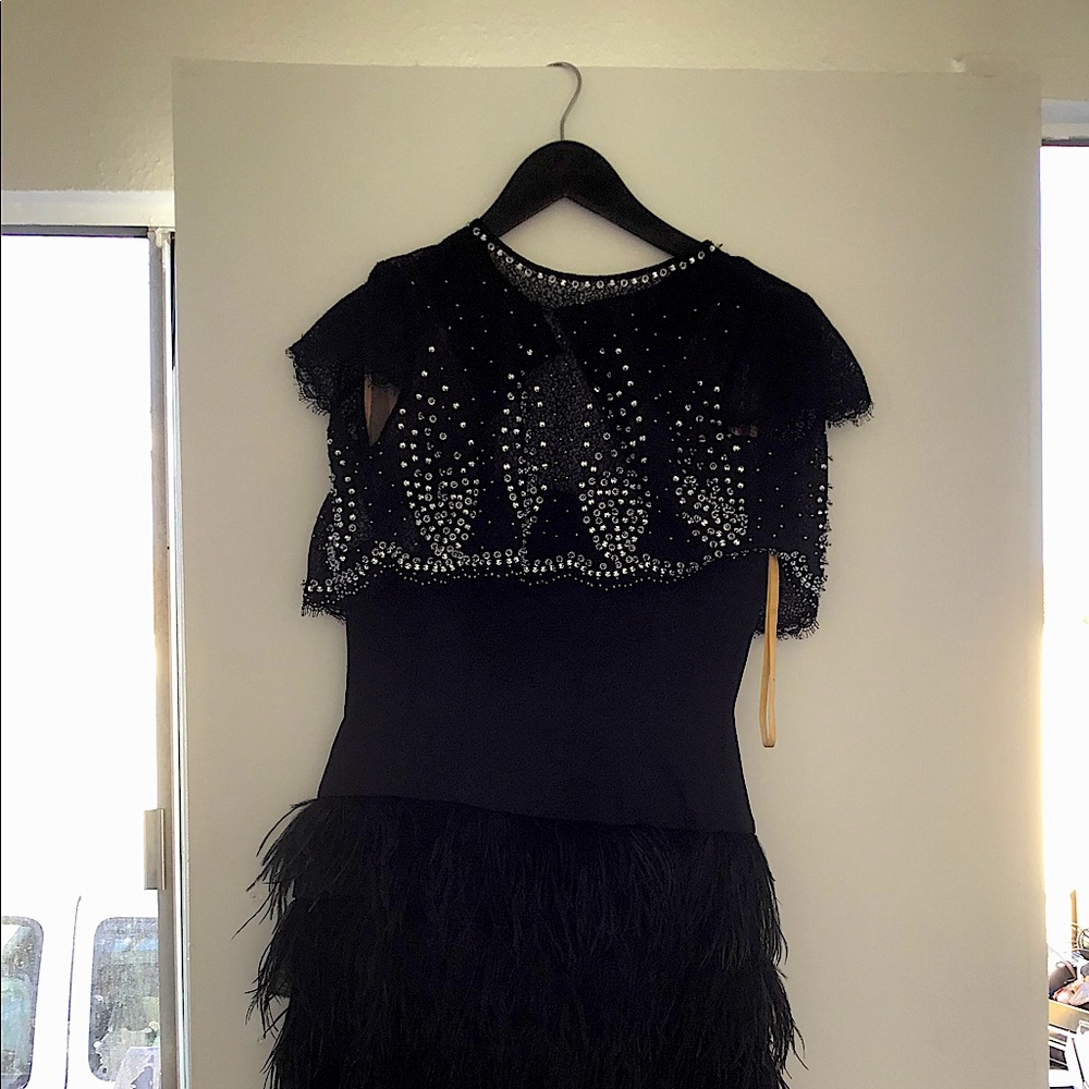 Black ostrich Feathered dress, with beading.